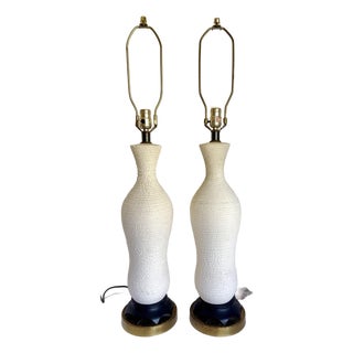 Mid 20th Century Hollywood Regency Textured White Ceramic Table Lamps With Sculptural Wood Bases - Pair For Sale