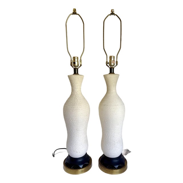 Mid 20th Century Hollywood Regency Textured White Ceramic Table Lamps With Sculptural Wood Bases - Pair For Sale