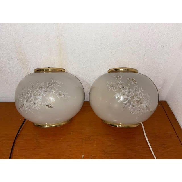Glass Wall Lights, 1970s, Set of 2, in Good conditions. Designed 1970 to 1979 European Plug (up to 250V).The wiring of...