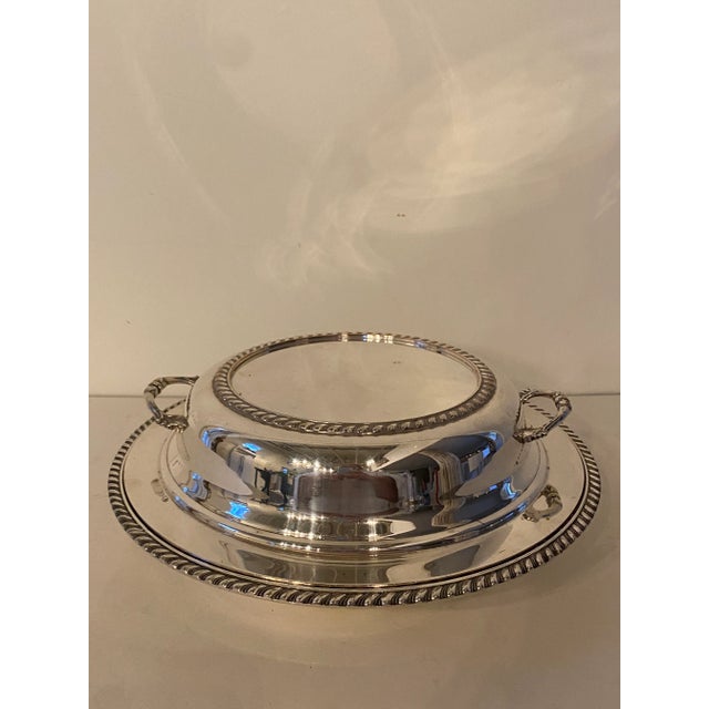 Lovely vintage silverplate (silver over copper) covered round dish with gadrooned edge on both top and bottom and applied...