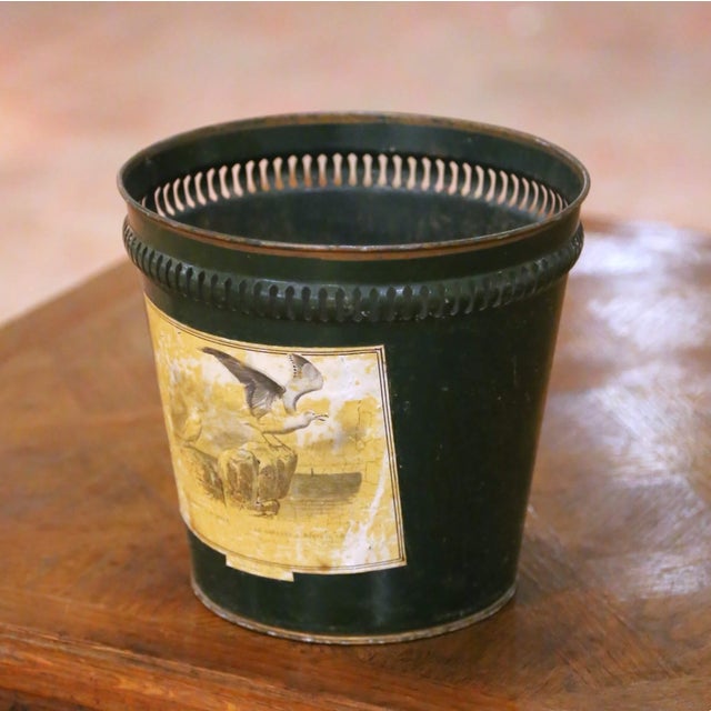 Decorate an office, powder room, or study with this charming antique painted waste basket. Crafted in France circa 1920,...