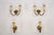 A refined set of four italian mid-century sconces, produced in the 1950s. Each piece combines lacquered conical holders...