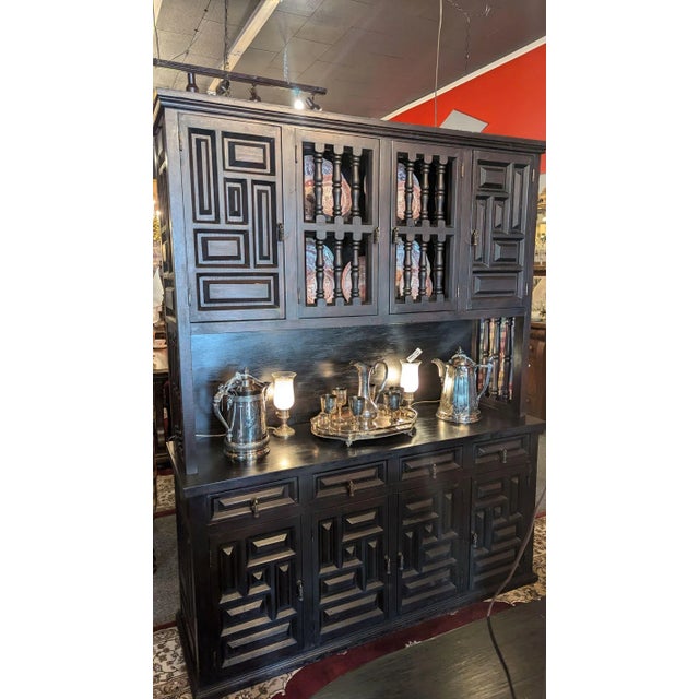This is a fabulous Arts and Crafts Flemish ebonized sideboard cabinet with geometric accents throughout. Flush base, four...