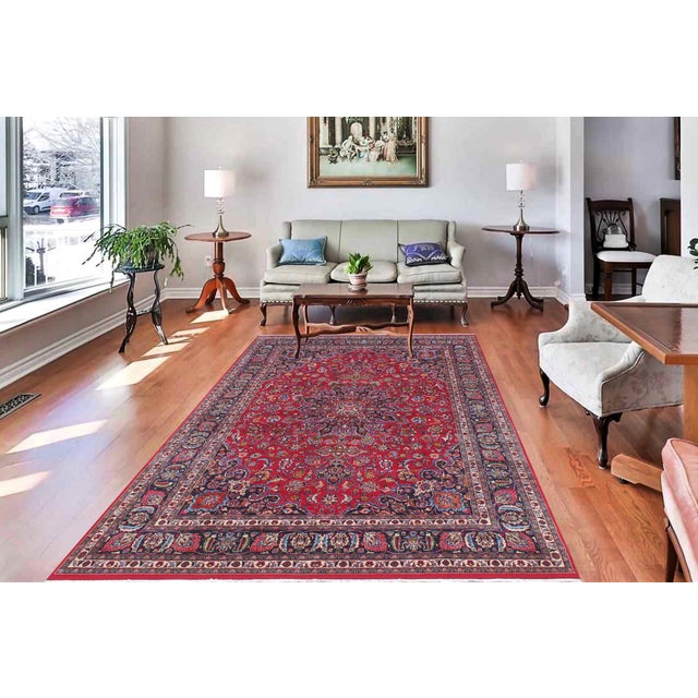 Hand knotted by skilled artisans from 100% wool and colored with all-natural vegetable dyes, this vintage antique-style...