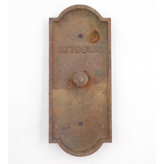 Antique Art Deco style bronze elevator plate with a single button. Inscribed 1676SW4 on the back. The original mounting...
