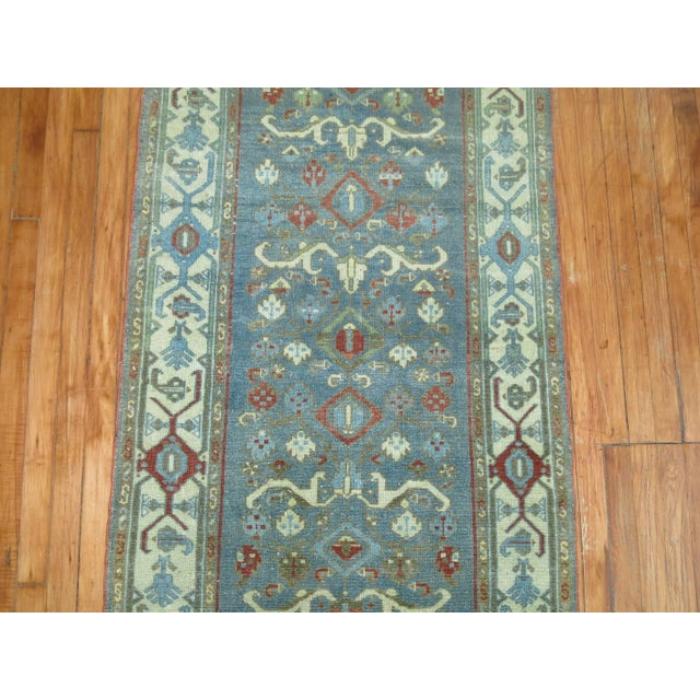 Early 20th century abrashed Persian Malayer runner. Accents in icy blue, green, brown and peppermint red. Measures: 3' x...