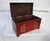 Red Painted Chest With Floral Motifs The large painted chest / trunk, painted red with floral motifs and a beautiful,...