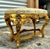 This exquisite bench showcases beautiful craftsmanship in every detail. It has been fully refinished in genuine gold leaf...