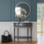 This elegant Butler Specialty Company demilune console table combines classic charm with a sleek, modern finish, making it...