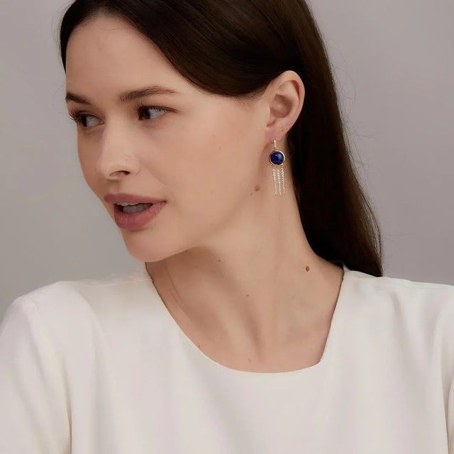 Created in 18 karat yellow gold Lapis lazuli 7.50 carats approx. Diamonds 0.80 carat approx. French wire for pierced ears...