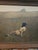 framed reproduction of the 1948 masterpiece Christina's World by American artist Andrew Wyeth