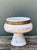 This sophisticated 1960s Italian ceramic pedestal bowl, imported by the renowned Rosenthal Netter, is a striking example...