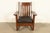 A gorgeous antique Mission or Arts & Crafts period cutout rocking chair By Charles Stickley USA, Circa 1910 Solid quarter...