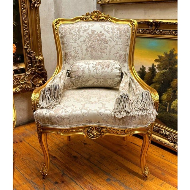 Bring timeless French elegance into your home with this beautifully crafted Louis XV-style armchair, featuring luxurious...