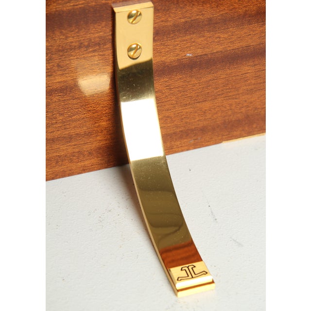 Wall bracket for the jaeger-lecoultre atmos “fontainebleu” clock. Mahogany and gold-plated brass. manufactured in the...