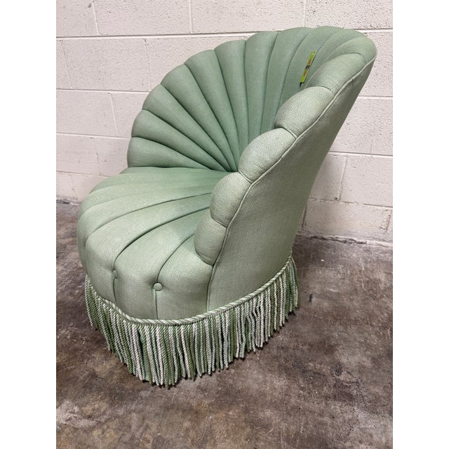 Fun beachy style shell shape slipper chair. Mint green in color. Great condition. A couple smudges to fabric, but would be...