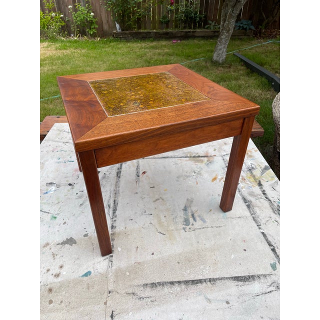 Solid walnut with copper tile top tables by John Keal for Brown Saltman, circa 1960s. Height: 15.25 in (38.74 cm) Width:...