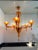 Contemporary Translucent orange Murano Glass Chandelier in Deco' Style Decorated in translucent orange colour which makes...