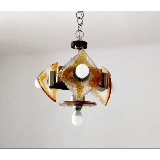 Mid-Century Italian Murano Glass Chandelier by Toni Zuccheri for Mazzega, 1960s, in Flawless conditions. Designed 1960 to...