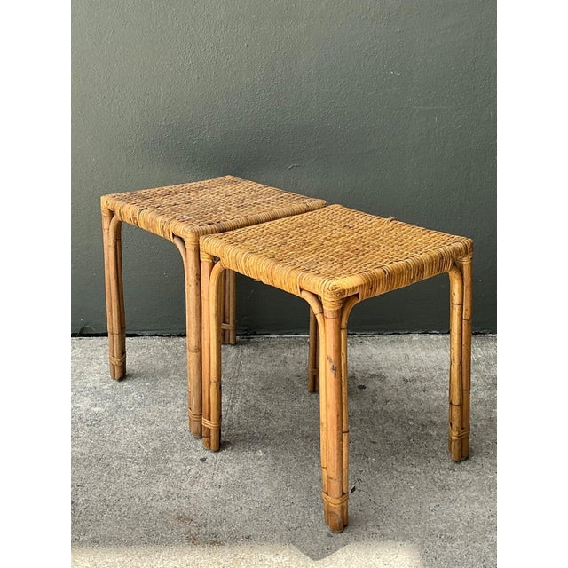 Exuding organic warmth and effortless mid-century elegance, this matched pair of vintage side tables brings a touch of...