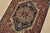 A traditional tribal Heriz rug hand-knotted with fine wool on a cotton foundation. This oriental rug features a central...