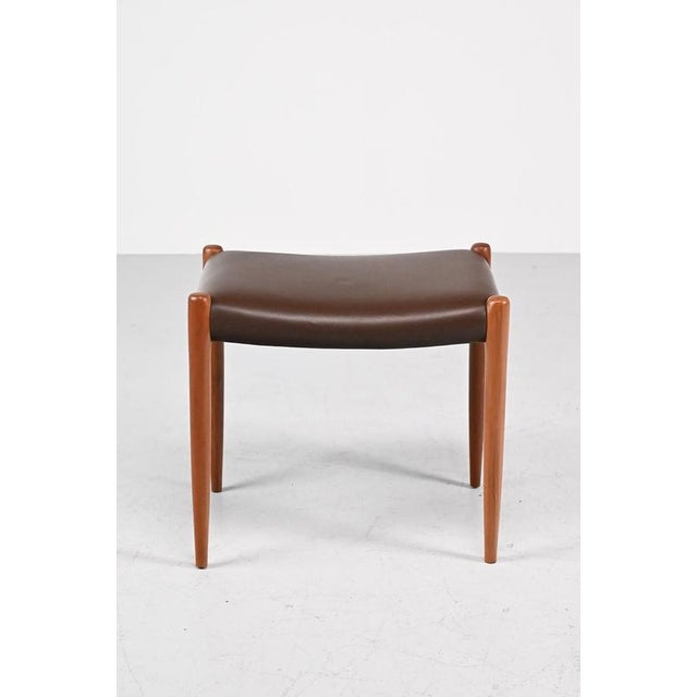 Niels otto møller model 80a hocker for j.l. Møllers møbelfabrik denmark. Made of teak and with a beautiful brown leather...