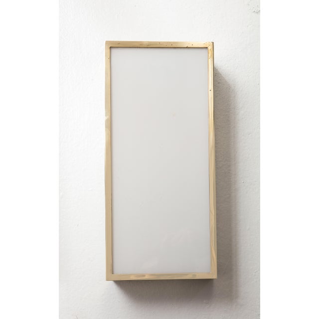 Pair of Bespoke milk glass and brass sconces.