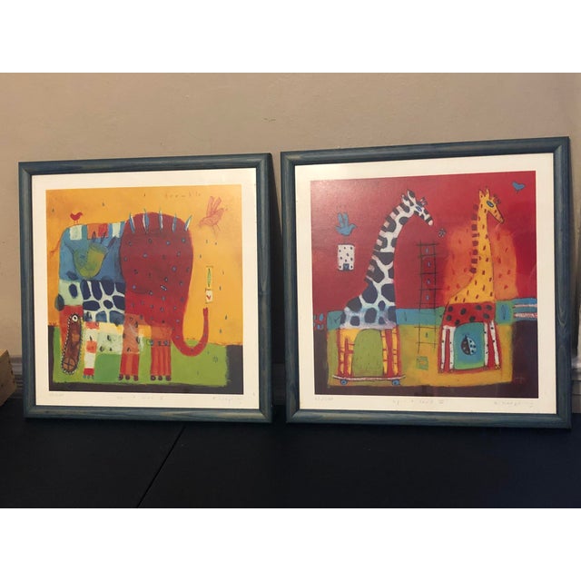 Offered as a charming matched pair, these limited-edition prints by Canadian artist Karen Hoepting feature her signature...