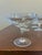 A beautiful set of eight vintage Josair Dorette crystal coupe glasses featuring an elegant etched fanburst motif and...
