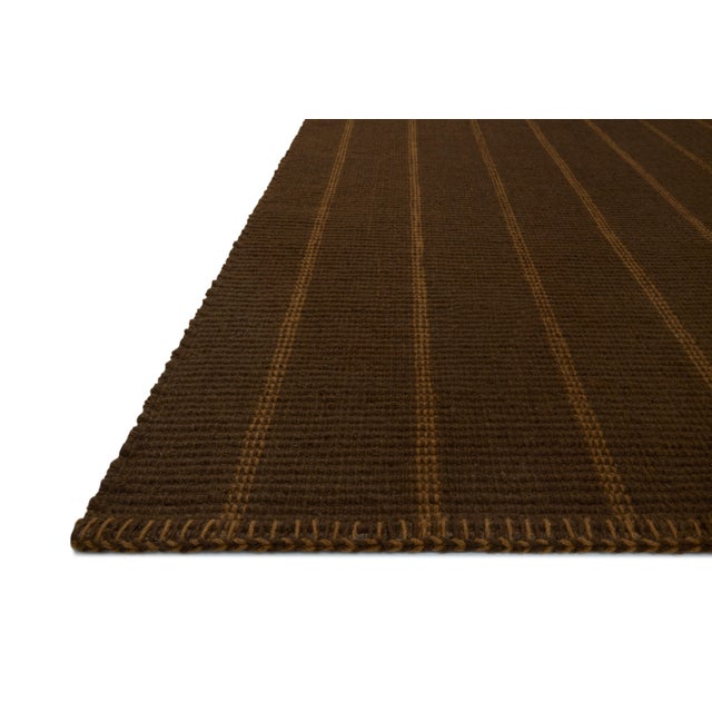 The Harlan Collection by Amber Lewis x Loloi is a classic striped flatweave area rug in the interior designer’s signature...