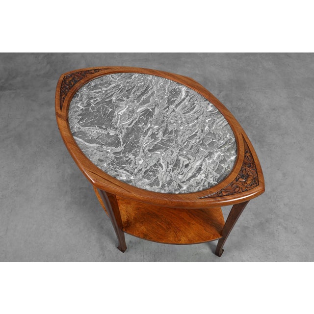 A graceful expression of early 20th‑century French design, this 1915 Art Nouveau side table unites the warmth of walnut...