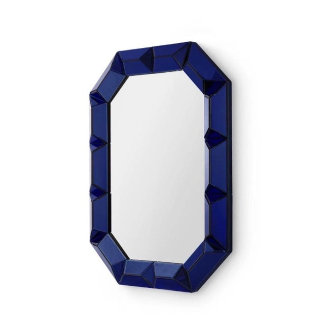 Bring bold Hollywood Regency glamour to your space with the Romano Wall Mirror in Sapphire Blue. Crafted with richly...