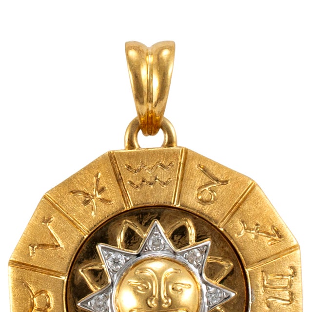Gender: Ladies Metal Type: 18K Yellow & White Gold Length: 1.25 inches Width: 27.00 mm Weight: 9.71 grams 18K white &...
