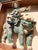 This is a wood framed antique Chinese roof tile featuring a mythical guardian warrior on a foo dog. Handpainted and...