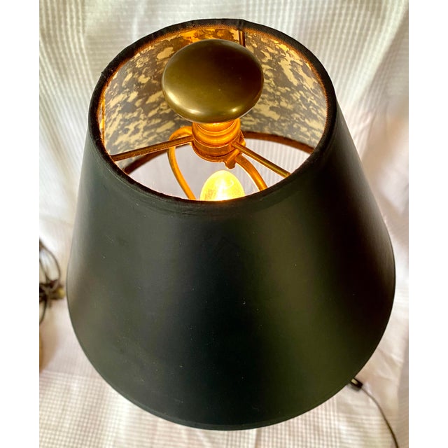 Pair of tall 24” Chapman Manufacturing Buffet Lamps with original black paper foil shades. They are wired with on/off hand...