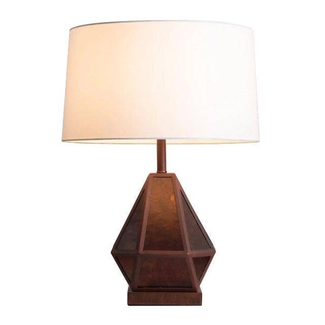 The Artifact Table Lamp is meticulously crafted with glimmering natural mineral mica and wood to bring elegance and...