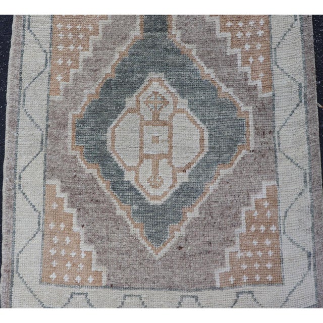 Traditional Long Turkish Oushak Runner With Soft Green Field and Beige Medallions For Sale - Image 3 of 16