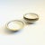 A set of 4 vintage ceramic small bowls by Syracuse China USA. Glossy white glaze with ruffled rims with yellow and black...
