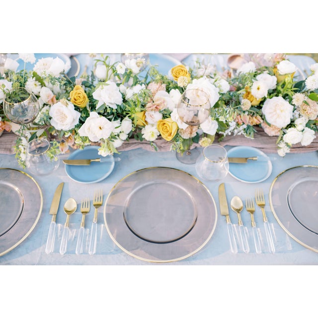 Sleek and modern, the Siren Charger draws inspiration from our Siren Glassware collection. Made in Italy with a hand-...