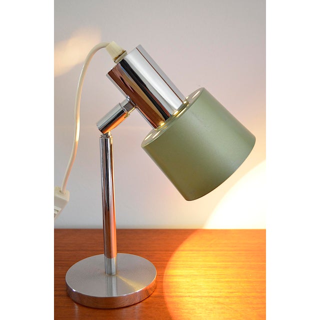 Very nice table lamp, probably a Swiss manufacturer RB - the table lamp is tiltable, the lampshade is painted in an...