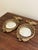 A gorgeous pair of Federal or Regency style small convex bullseye wall mirrors featuring an eagle with open wings and 13...