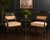 This elegant pair of Drexel Heritage armchairs showcases a refined Chinoiserie and Regency-inspired design, executed in a...