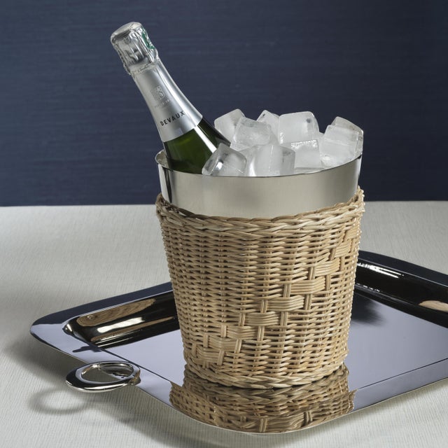 A stunning fusion of natural woven rattan and nickel-finished steel, this wine bucket adds a rustic yet refined touch to...