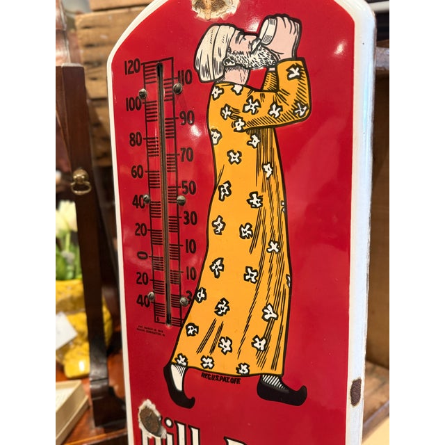 A fantastic and highly collectible antique Hills Bros. Coffee porcelain thermometer sign dating to circa 1915. This early...