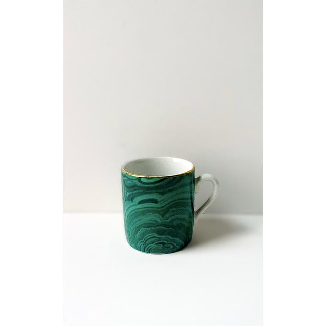 A beautiful green malachite porcelain espresso coffee or tea demitasse cup, circa late-20th century, 1980s, '90s. Cup has...