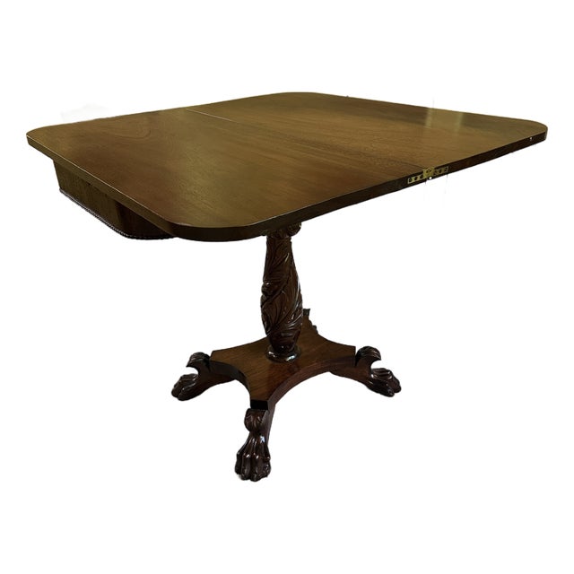 Early 20th Century Mahogany Fold-Over Tea & Game Table With Carved Pedestal and Claw Feet For Sale