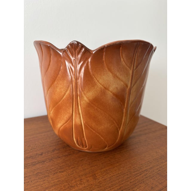 Charming vintage planter made of handcrafted French ceramic. Its open flower shape and embossed leaf design give it a...