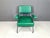 Mid century italian armchair with green vinyl upholstery and black lacquer tubular frame. Industrial inspired design....