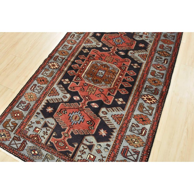 This authentic vintage tribal Zanjan rug is hand-knotted with fine wool and natural dyes. This nomadic oriental rug...