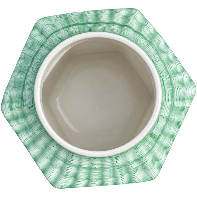 Elegant pair of vintage Mikasa porcelain ginger jars featuring a beautiful green-and-white chinoiserie design. Each...
